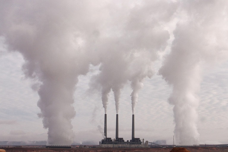 Factory polluting the air with smoke